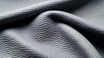 Closeup of muted winter grey leather with a fine grain and matte finish conveying the calmness of a snow covered field photo