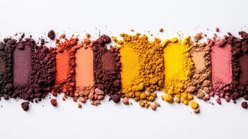 Deep mahogany and honeyed yellow pigment powders arranged in a fading gradient like a fall sunset sky photo
