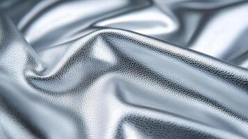 Icy silver leather with a soft metallic sheen and fine pebble texture capturing the essence of a winter frost photo