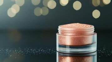 Luxurious rose gold highlighter spread with a soft creamy texture on a reflective glass surface catching light photo