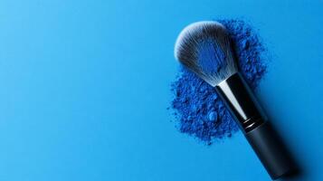 Satin finish translucent powder with soft shimmer spread on a dark blue gradient creating a celestial effect photo