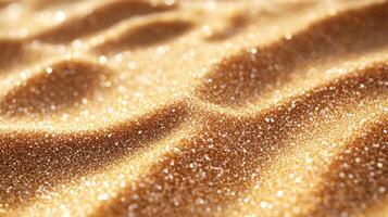 A close up of sand with water droplets on it photo