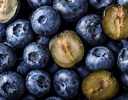 Overhead view of Fresh, Ripe and juicy blueberries. Halves food summer background photo