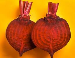 Red beetroot and beetroot cross sectoin. Full Frame, Top View. Flat lay, top view. Pop art design, creative summer concept. photo