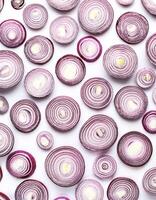red onion slices. pattern texture background. isolated on white background photo