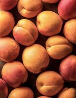 Overhead view of Fresh Ripe organic apricots healthy food background. photo