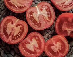 Overhead view of Fresh Ripe juicy red Tomato halves food summer background photo
