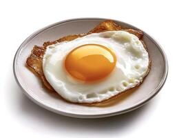 fried egg isolated on white background photo