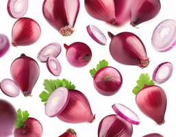 Flying red onion cuts and slices isolated on a white background photo