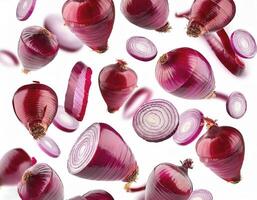 Flying red onion cuts and slices isolated on a white background photo