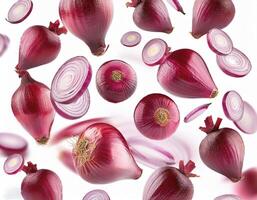 Flying red onion cuts and slices isolated on a white background photo