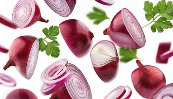 Flying red onion cuts and slices isolated on a white background photo