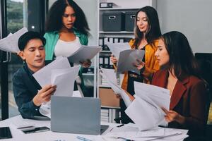 Stress, business people and employee frustrated with multitasking, pressure or overworked by team in chaos with paperwork. Anxiety, headache and worker overwhelmed by group and burnout in crisis photo