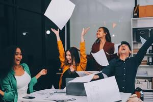 Motivated funny diverse business team people dancing celebrating success at corporate party on friday, happy friendly multiracial coworkers group having fun together enjoy victory dance in office photo