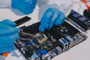 Electronics technician, electronic engineering electronic repair, electronics measuring and testing, repair and maintenance concepts. photo
