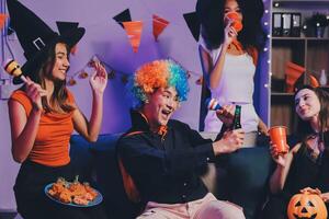 Joyful office Halloween party with coworkers in costumes, celebrating with drinks and laughter, fostering teamwork and festive spirit photo