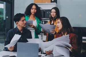 Stress, business people and employee frustrated with multitasking, pressure or overworked by team in chaos with paperwork. Anxiety, headache and worker overwhelmed by group and burnout in crisis photo