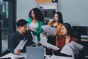 Stress, business people and employee frustrated with multitasking, pressure or overworked by team in chaos with paperwork. Anxiety, headache and worker overwhelmed by group and burnout in crisis photo