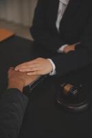 Law theme, gavel or mallet of the judge, lawyer enforcement officers, evidence-based cases taken into account in the court abount business, legislation. photo