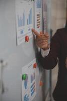 Audit concept,Administrator business man financial inspector and secretary making report calculating balance. Internal Revenue Service checking document. photo
