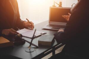 Law theme, gavel or mallet of the judge, lawyer enforcement officers, evidence-based cases taken into account in the court abount business, legislation. photo