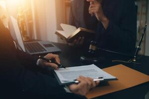 Law theme, gavel or mallet of the judge, lawyer enforcement officers, evidence-based cases taken into account in the court abount business, legislation. photo