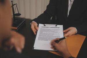 Law theme, gavel or mallet of the judge, lawyer enforcement officers, evidence-based cases taken into account in the court abount business, legislation. photo