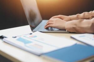 business documents businessman check legal document review Prepare documents or analysis reports, tax items, accounting documents, data contracts, office partner agreements. photo