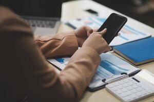 business documents businessman check legal document review Prepare documents or analysis reports, tax items, accounting documents, data contracts, office partner agreements. photo