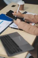 business documents businessman check legal document review Prepare documents or analysis reports, tax items, accounting documents, data contracts, office partner agreements. photo