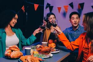 Joyful office Halloween party with coworkers in costumes, celebrating with drinks and laughter, fostering teamwork and festive spirit photo