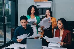 Stress, business people and employee frustrated with multitasking, pressure or overworked by team in chaos with paperwork. Anxiety, headache and worker overwhelmed by group and burnout in crisis photo