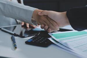 Business handshake for teamwork of business merger and acquisition,successful negotiate,hand shake,two businessman shake hand with partner to celebration partnership and business deal concept photo