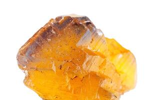 Macro mineral stone Fluorite yellow and blue color on a white background photo