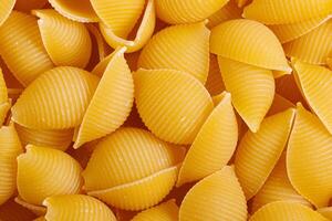 Pasta products in the form of a shell, texture photo
