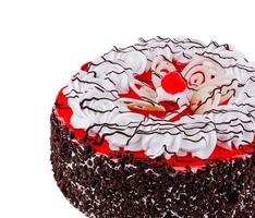 This delicious cake is decorated with frosting and a cherry on top photo