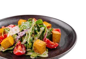 Fresh vegan salad with tofu and vegetables photo