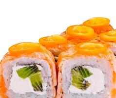 Salmon and kiwi sushi rolls garnished with sliced orange photo