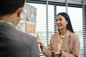 Diverse Program Developer Team Collaborates on UXUI Design in Modern Office Setting photo