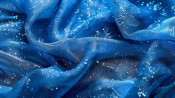 Sparkling Blue Fabric Waves with Glittering Details photo