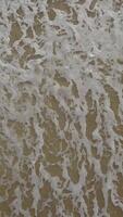 Movement of ocean waves seen from above by drone. video
