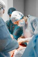 Surgeons performing a delicate operation in a modern operating room, surrounded by advanced medical equipment. The photo captures a moment of precision and expertise in a high-tech environment