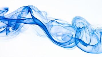 Delicate blue tendrils of smoke spiral upward, blending dark and light hues, fading into the white backdrop. An enchanting vision of movement and elegance unfolds. photo