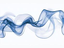 Soft tendrils of deep blue smoke rise and dance in ethereal patterns, blending into lighter hues on a pristine white backdrop, creating a mesmerizing visual experience. photo