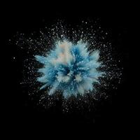 A dynamic explosion of blue particles radiates from a central point, scattering outward with glowing trails, evoking a sense of energy and movement in the dark. photo