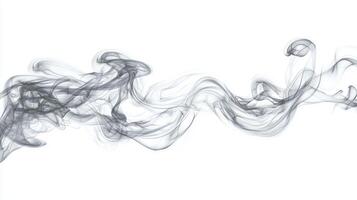 Curling gray smoke tendrils twist and blend into the air, producing soft, flowing patterns against a crisp white backdrop, evoking a sense of tranquility and artistry. photo