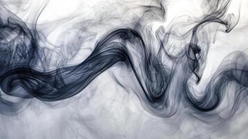 Curling tendrils of gray smoke elegantly twist and rise into the air, blending rich hues of gray seamlessly with the white backdrop. The intricate details evoke a sense of calm and mystery. photo