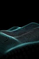 Turquoise particles create a mesmerizing wave-like formation against a dark background, suggesting a sense of motion and cosmic tranquility in a minimalist design. photo