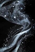 A mesmerizing arrangement of silver dots undulates gracefully, creating a dynamic wave effect on a deep black background, emphasizing motion and fluidity. photo