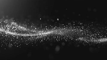 Silver dots elegantly disperse across a dark backdrop, resembling distant constellations. This cosmic arrangement emits a gentle glow, enhancing its minimalist allure. photo